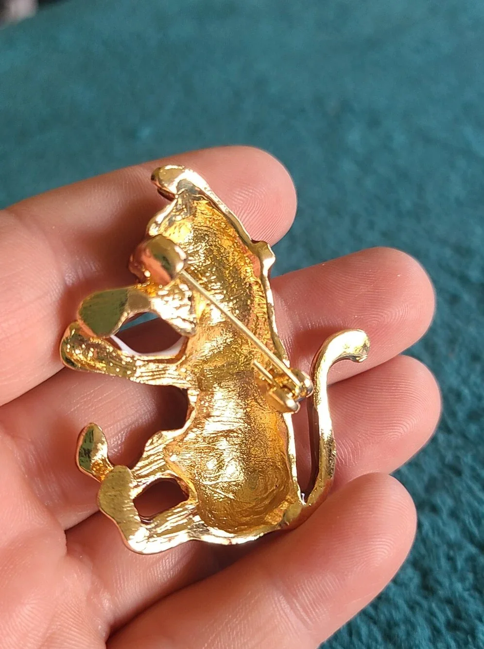 Vintage Gold-Tone Cat Brooch with Green Eye and White Accents - Vintage